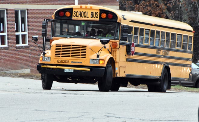 First Student school buses will continue to roll in Seacoast towns like Newmarket as talks continue with the drivers' union. Photo by Buzz Dietterle/seacoastonline