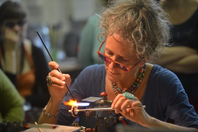 Kristina Logan, who makes glass beading, will open her studio for this weekend's Portsmouth Holiday Arts Tour. Courtesy photo