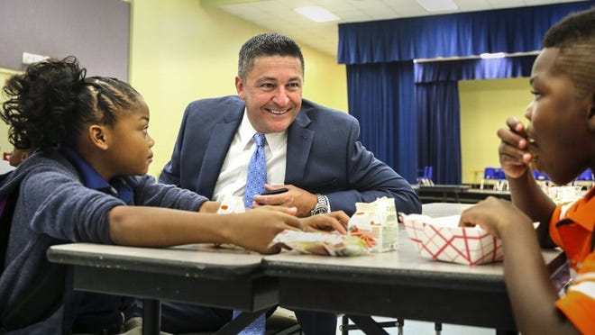 Palm Beach County Schools Superintendent Robert Avossa talks with a student. (Lannis Waters / The Palm Beach Post)