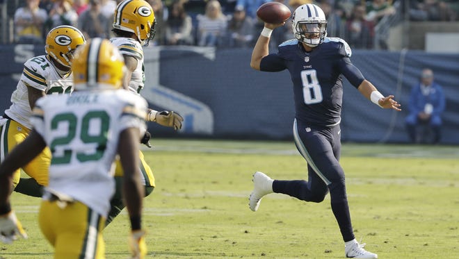 Tennessee Titans quarterback Marcus Mariota (8) passes against the Green Bay Packers in the first half of a game Sunday in Nashville, Tenn. (Associated Press)