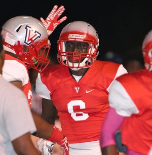 Vanguard's Tyree Gillespie ran for three touchdowns in the Knights' win against Mitchell on Friday night in New Port Richey. (Bruce Ackerman/Staff photographer/File)