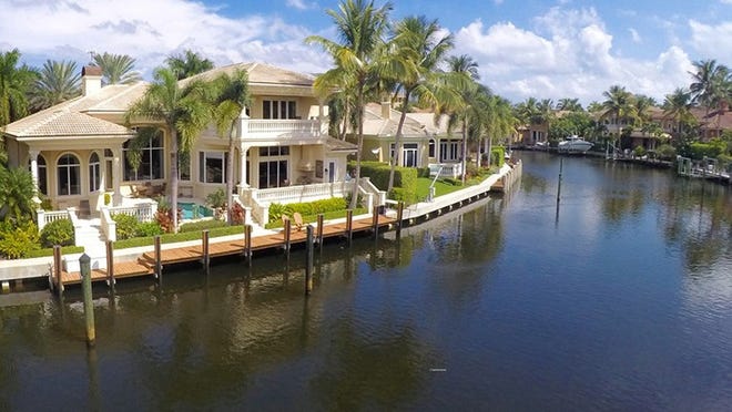 Stunning south exposure with incredible water views and 70-foot dock at your door step.