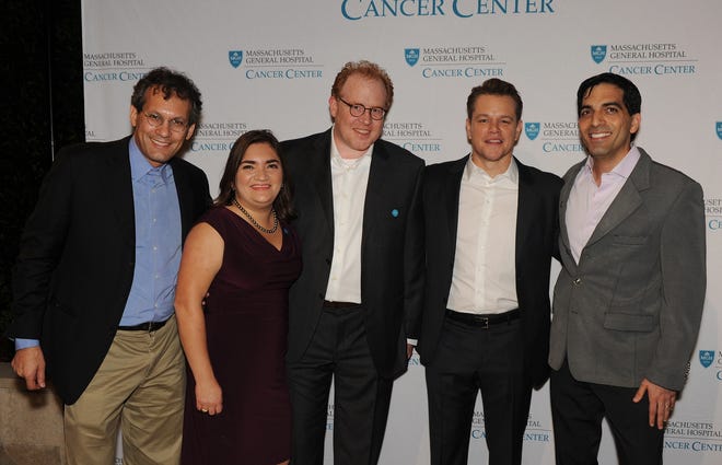 Dr. Mark Cobbold, of Winchester, investigator in the Center for Cancer Immunology at the Massachusetts General Cancer Center, attends a private event, hosted by actor Matt Damon, at the Montage Beverly Hills in California that raised awareness and funds for the Center for Cancer Immunology at the Massachusetts General Cancer Center. Pictured, from left: Dr. Nir Hacohen, director of the Center for Cancer Immunology at the Massachusetts General Cancer Center; Dr. Marcela Maus, director of the Cellular Immunotherapy Program at the Massachusetts General Cancer Center; Cobbold; Damon; and Dr. Shawn Demehri, investigator in the Center for Cancer Immunology at the Massachusetts General Cancer Center. Courtesy Photo / Carlos Delgado