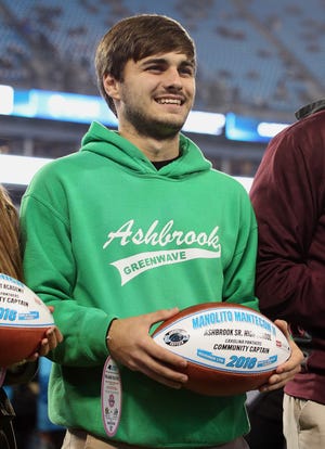 Ashbrook High School's Lito Mantecon was recognized along with other high-achieving student-athletes from North and South Carolina as a Panthers Community Captain before the Panthers game Thursday night at Bank of America Stadium. JOHN CLARK/THE GAZETTE