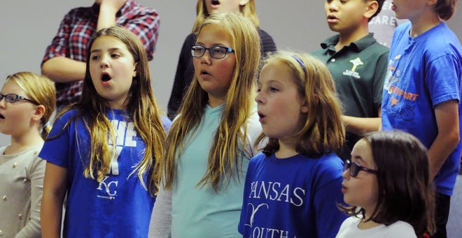 Members of the Kansas Youth Chorale rehearse songs of the season for their “Glad Tidings We Sing!” concert which will be at 7 p.m. Sunday at First Presbyterian Church, 817 S.W. Harrison. (Bill Blankenship/The Capital-Journal)