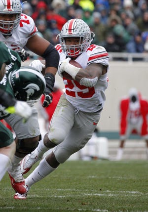 Mike Weber rushed for 111 yards and a touchdown against Michigan State on Saturday. The Associated Press