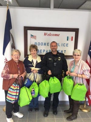 Pictured are, left to right, Marvalene Anderson, Lorrie Whitaker, Officer David Ades and Carol Mathews.
