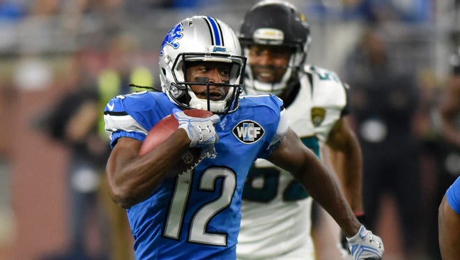 Detroit Lions wide receiver Andre Roberts returns a punt return for a 55-yard touchdown during the first half of an NFL football game against the Jacksonville Jaguars, Sunday, Nov. 20, 2016 in Detroit. (AP Photo/Jose Juarez)