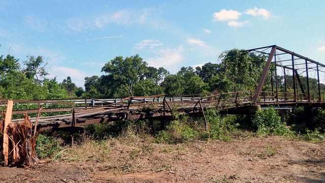 Neighborhood residents ask Bastrop County Comissioners to repair and secure the retired Lower Elgin Road Bridge, which was heavily damaged in the 2015 Memorial Day flood. Contributed