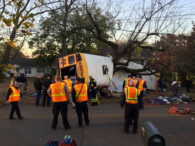 Chattanooga Fire Department/Associated Press Chattanooga Fire Department personnel work the scene of a fatal school bus crash Monday in Chattanooga, Tenn. Officials said late Monday there were multiple fatalities in the accident.