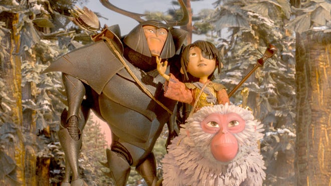 Beetle, Kubo, and Monkey emerge from the forest and take in the beauty of the landscape in the stop-motion animated tale “Kubo and the Two Strings.” LAIKA STUDIOS / FOCUS FEATURES