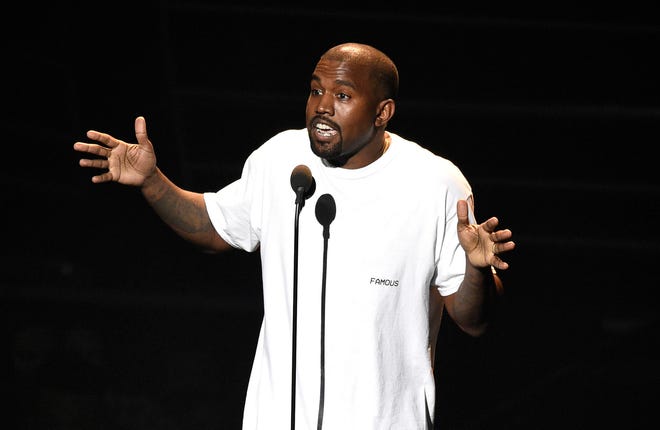 FILE - In this Aug. 28, 2016, file photo. Kanye West appears at the MTV Video Music Awards at Madison Square Garden in New York. At a Sacramento concert Saturday, Nov. 19, West told the audience he heard Beyoncé refused to perform at the MTV Video Music Awards unless she won Video of the Year over him, and also urged Jay Z to call him and not to send killers. (Photo by Chris Pizzello/Invision/AP, File)