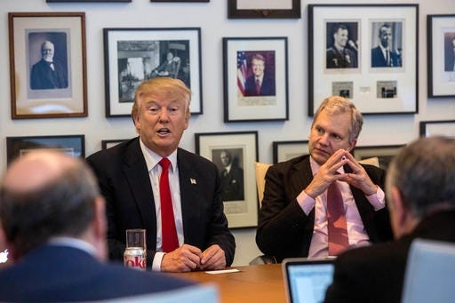 President-elect Donald Trump, left, and New York Times Publisher Arthur Sulzberger Jr., right, meet with editors and reporters of the newspaper on Tuesday in New York. AP photo