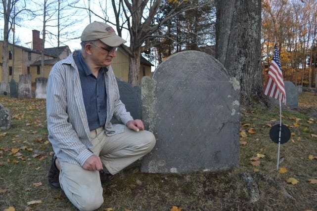 York Historian James Kences in the Old Burying Ground in York next to key gravestones of York participants in the battle of Louisbourg.

Photo by David Ramsay