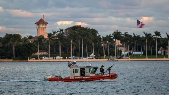 The U.S. Coast Guard patrols the intracoastal waterway as President-elect Donald Trump is enroute to PBIA for Thanksgiving holiday in Palm Beach, Florida on November 22, 2016. (Allen Eyestone / The Palm Beach Post)