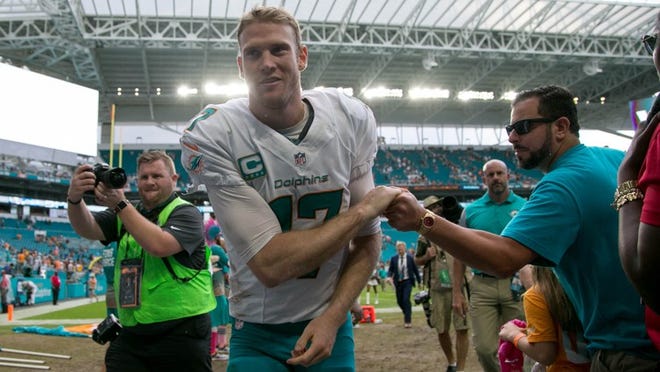 Miami Dolphins quarterback Ryan Tannehill (17) exits stadium after win over the Steelers at Hard Rock Stadium in Miami Gardens, Florida on October 16, 2016. (Allen Eyestone / The Palm Beach Post)