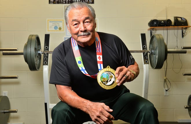 Lt. Johnny Yong with the Sarasota County Sheriff's Office returned from the World Association of Bench Pressers and Deadlifters competition in Las Vegas with a world champion title. Herald-Tribune staff photo / Mike Lang