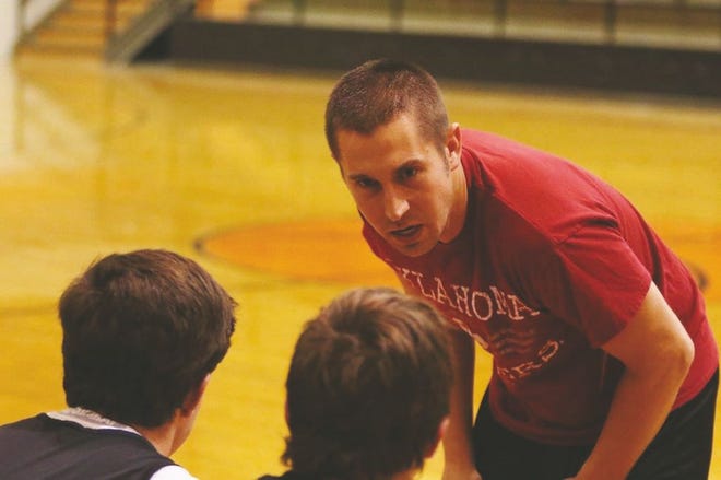 Pawhuska basketball coach Jake Christenson talks to players.

Jack Buzbee/J-C correspondent