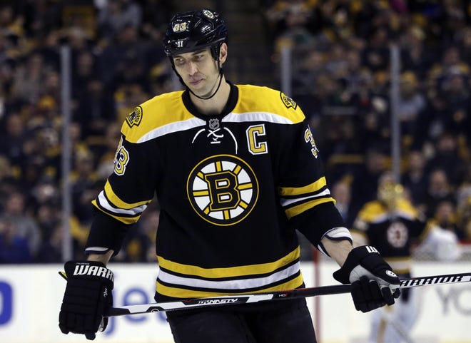 Boston Bruins defenseman Zdeno Chara reacts during the second period of Tuesday's game against St. Louis; a lower body injury suffered against the Blues has Chara "doubtful" for the next two games. AP photo