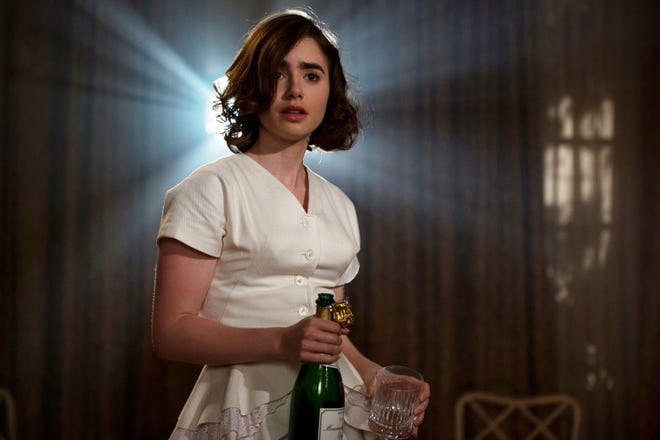 This image shows Lily Collins in a scene from "Rules Don't Apply." (Regency Enterprises)