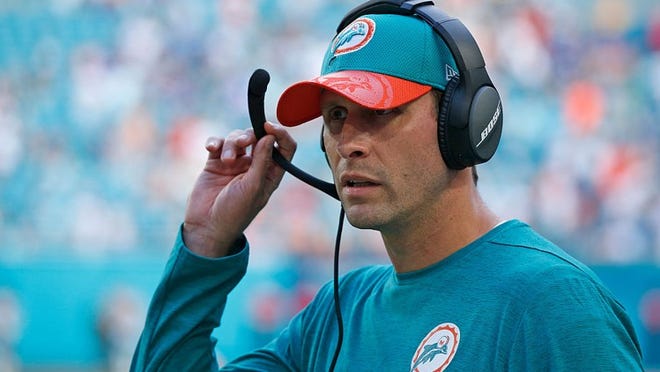 MIAMI GARDENS, FL - OCTOBER 23: Head coach Adam Gase of the Miami Dolphins works the sideline in the final minute of the game against the Buffalo Bills on October 23, 2016 at Hard Rock Stadium in Miami Gardens, Florida. Miami defeated Buffalo 28-25. (Photo by Joel Auerbach/Getty Images)