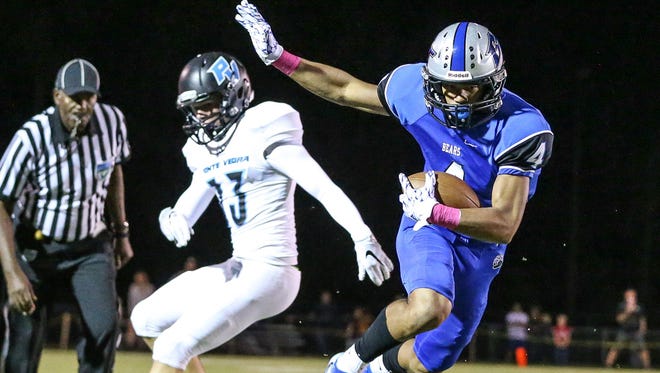 Bartram Trail’s Xavier Hutchinson (4) catches a pass and stays in-bounds against Ponte Vedra a game on Oct. 21. Both the Bears and the Sharks are still alive in the state playoffs as Week 3 games arrive on Friday. (Gary McCullough, For the Times-Union).