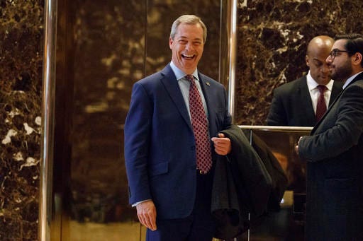 FILE - In this Saturday, Nov. 12, 2016, file photo, U.K. Independence Party leader Nigel Farage smiles as he arrives at Trump Tower, in New York. Farage, the interim leader of the U.K. Independence Party, says he is "flattered" by Donald Trump's suggestion that he become Britain's ambassador to the United States. Farage said Tuesday he would do anything possible to help relations between the two countries even as Prime Minister Theresa May's office said Britain already has an ambassador in place in Washington. (AP Photo/ Evan Vucci, File)