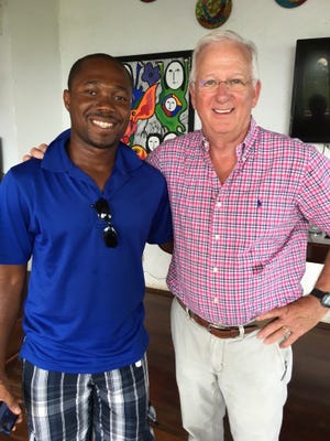 Alex Synal, left, and Jim Willey, Help for Haiti founder and director, are seen in Haiti. Willey’s nonprofit will allocate all October donations, totaling $13,000, to Hurricane Matthew relief in south Haiti. Courtesy photo