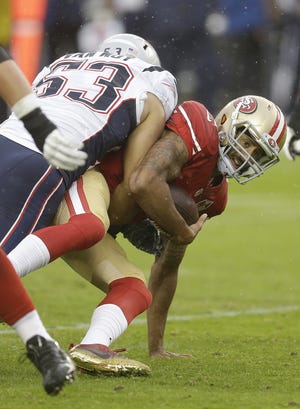 New England Patriots outside linebacker Kyle Van Noy (53) sacks San Francisco 49ers quarterback Colin Kaepernick (7) in last Sunday's game. AP photo