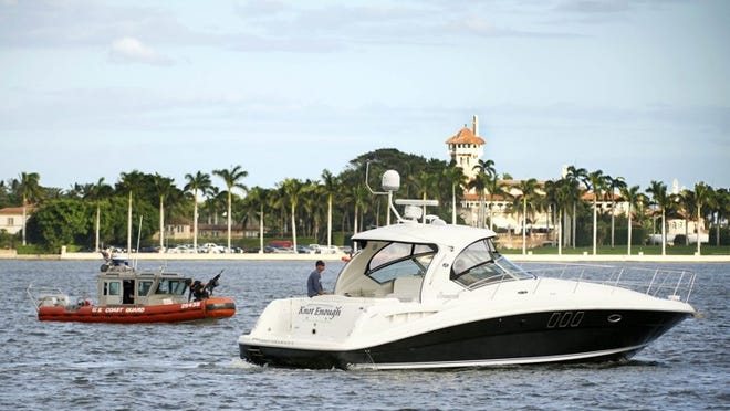 The United States Coast Guard keeps boaters away from the east side of the Intracoastal Waterway Wednesday while the president-elect Donald Trump visits Mar-a-Lago Club. (Meghan McCarthy / The Palm Beach Post)