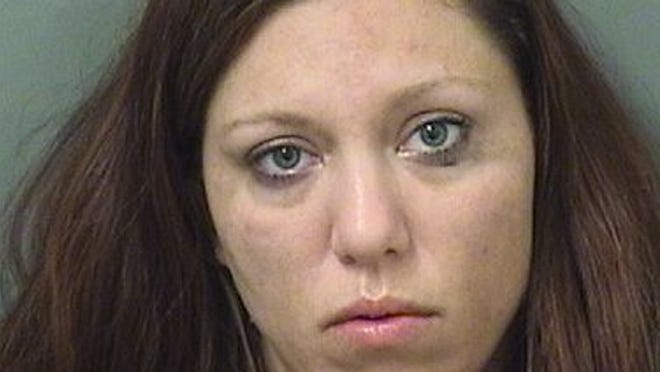A a 32-year-old woman was arrested after she bit the tip of a man’s finger off during an argument Saturday morning, according to city police.