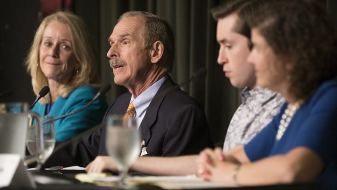 Austin City Council candidate Rob Walker, second from left, speaks at the Austin City Council District 10 candidate forum at the Dell Jewish Community Center Tuesday September 20, 2016. Listening are, left to right, Council Member Sheri Gallo, and candidates Nicholas Virden and Alison Alter.
