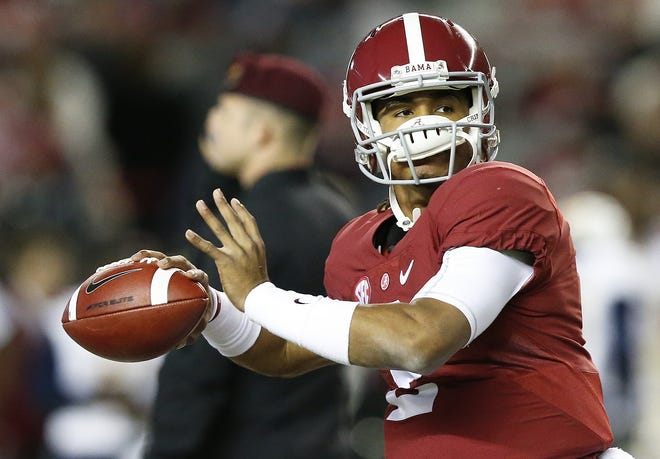 Alabama quarterback Jalen Hurts sets back to pass during an NCAA college football game against Chattanooga, Saturday, Nov. 19, 2016, in Tuscaloosa, Ala. (AP Photo/Brynn Anderson)