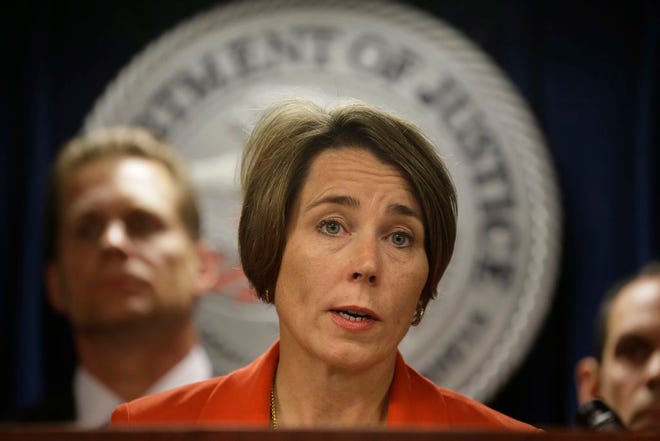Massachusetts Attorney General Maura Healey responds to questions from reporters during a news conference at the federal courthouse, Thursday, June 9, 2016, in Boston. Plymouth County District Attorney Timothy Cruz, along with two other prosecutors in the state, are being sued by Massachusetts Attorney General Maura Healey after his office refused to turn over information in response to a public records request.