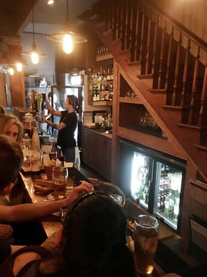 The remodeled Barley Republic Public House makes great use of space under a staircase where they’ve constructed a very tidy bar. (Dan Macdonald/Florida Times-Union)