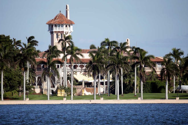 This Monday, Nov. 21, 2016, photo, shows the Mar-a-Lago resort owned by President-elect Donald Trump in Palm Beach, Fla. When Trump arrives at his Mar-a-Lago resort for Thanksgiving, it won't be the first time a president-elect has used Palm Beach as his vacation refuge. John Kennedy's family estate, known during his term as the Winter White House, is seven miles north at the other end of Ocean Drive. (AP Photo/Lynne Sladky)