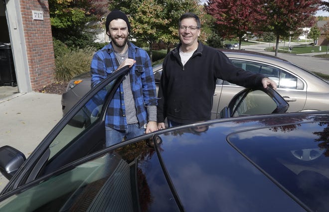 Writer Tom Krisher, right, spent two months helping his future son-in-law, Casey Smith, find a good, cheap used car. 

AP/Carlos Osorio