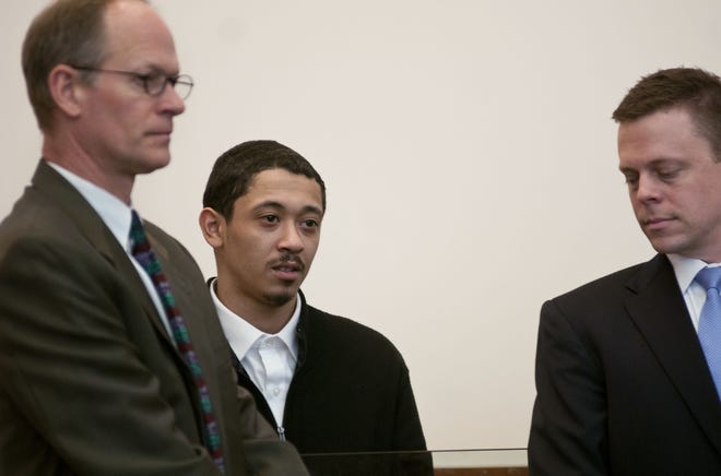 Francis O. Arbolay, center, at his arraignment for murder in the stabbing death of Christopher Starkweather of Hubbardston. His lawyers, at left and right, John Swomley & Matthew E. Cole.  T&G Staff/Christine Peterson