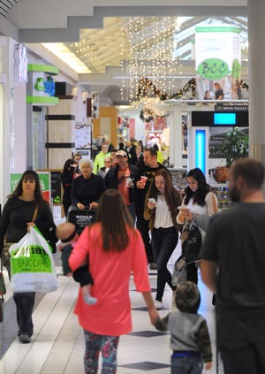 Shoppers fill New Towne Mall looking for deals on Black Friday in New Philadelphia. (TimesReporter.com / Pat Burk)