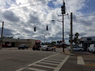 Daytona Beach police had the Main Street bridge blocked Wednesday afternoon after a body was discovered floating in the river. NEWS-JOURNAL/KATIE KUSTURA