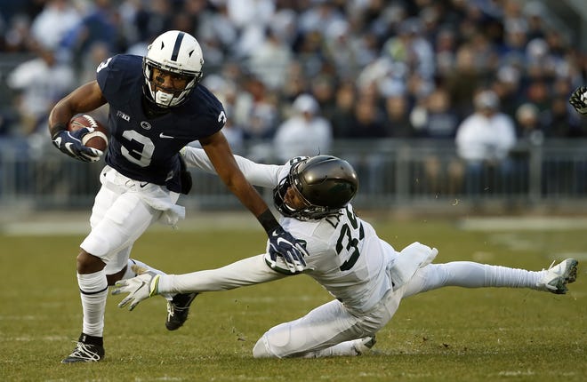 Penn State's DeAndre Thompkins (3) gets past Michigan State's Justin Layne (39) after a catch during the first half of an NCAA college football game in State College, Pa., Saturday Nov. 26, 2016. (AP Photo/Chris Knight)