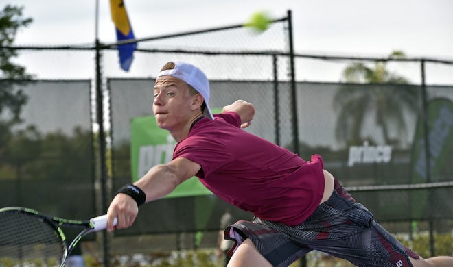 Daniil Glinka of the Republic of Estonia returns the ball to Russell Benkaim of Osprey, Florida, off camera, during the annual Eddie Herr International Tennis Championship at IMG Academy in Bradenton in 2015. More than 2,000 players will participate in this year's tournament, which begins Monday. HERALD-TRIBUNE STAFF FILE PHOTO / THOMAS BENDER