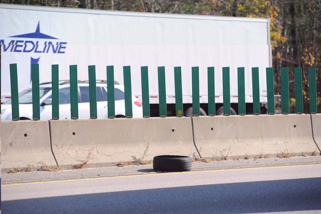 A tire on Route 24 median in Brockton on Wednesday, Nov. 2, 2016.
(Marc Vasconcellos/The Enterprise)