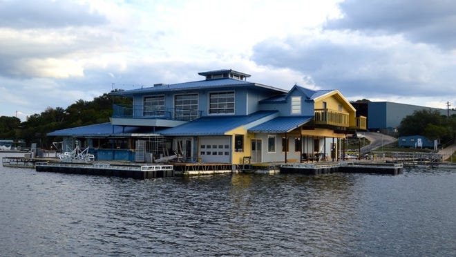 The Johnny Fins building, which is newer and larger than the Gnarly Gar’s current facility, currently floats in Hurst Harbor, and will be moved to Point Venture in mid-December. CONTRIBUTED