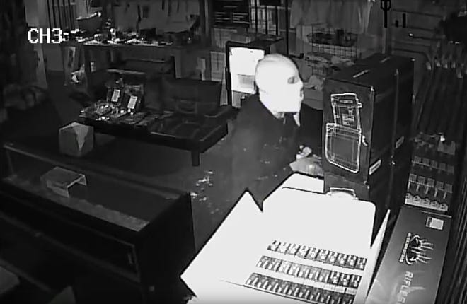 This screenshot was taken of a burglar inside Aim and Defend in Lowell Saturday.