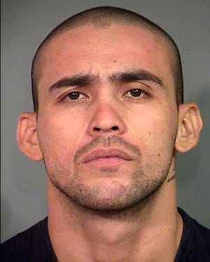 FILE - This undated file photo provided by the North Las Vegas Police Department shows Alonso Perez, 25. Authorities say the Nevada homicide suspect who escaped from police custody in September 2016, before being recaptured four days later has been linked to two additional slayings. (The North Las Vegas Police Department via AP, file)
