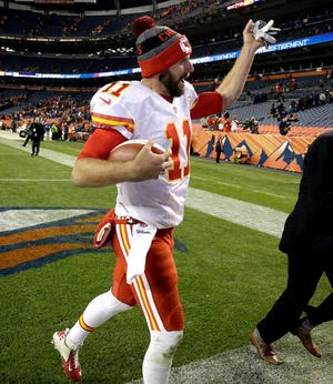 Kansas City Chiefs quarterback Alex Smith (11) leaves the field after an NFL football game against the Denver Broncos, Sunday, Nov. 27, 2016, in Denver. The Chiefs won 30-27 in overtime. (AP Photo/Jack Dempsey)