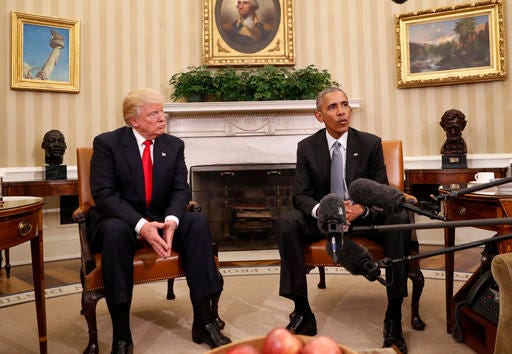 FILE - In this Nov. 10, 2016 file photo, President Barack Obama meets with President-elect Donald Trump in the Oval Office of the White House in Washington. President Barack Obama took on America’s problems of a lack of access to health care and high cost, but he and the Democrats paid a political price. Now President-elect Donald Trump has promised to undo much of what Obama put in place while vowing to make the system better for average folks. (AP Photo/Pablo Martinez Monsivais, File)