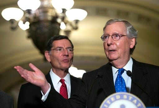 Senate Majority Leader Mitch McConnell of Ky., speaks to the media along side Sen. John Barrasso, R-Wyo., after the Senate Policy Luncheon on Capitol Hill, Tuesday, Nov. 29, 2016 in Washington. (AP Photo/Molly Riley)