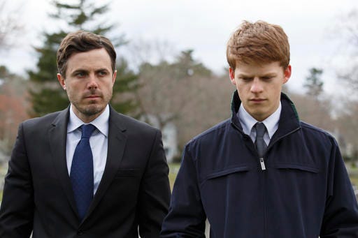 This image released by Roadside Attractions and Amazon Studios shows Lucas Hedges, right, and Casey Affleck in a scene from "Manchester By The Sea." The film has been named best film by the National Board of Review, which lavished four awards on Kenneth Lonergan’s New England portrait of grief. In awards announced Tuesday by the National Board of Review, “Manchester by the Sea” also took best actor for Casey Affleck’s lead performance, best screenplay for Lonergan’s script and best supporting actor for the breakout performance by Lucas Hedges. (Claire Folger/Roadside Attractions and Amazon Studios via AP)